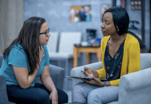 Trauma therapist offering EMDR therapy session in a peaceful setting